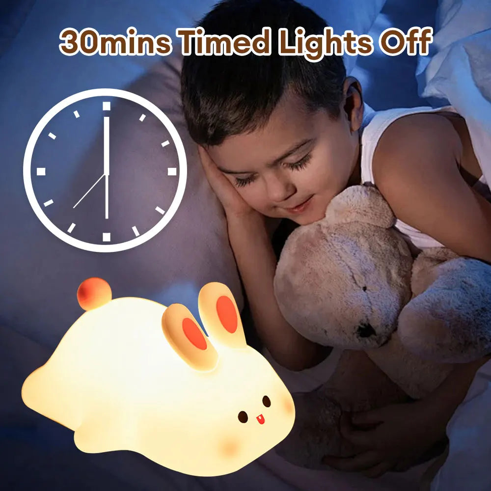 Night light with silicone big face in the form of rabbit, duck, panda, capybara, and pig. Rechargeable via USB